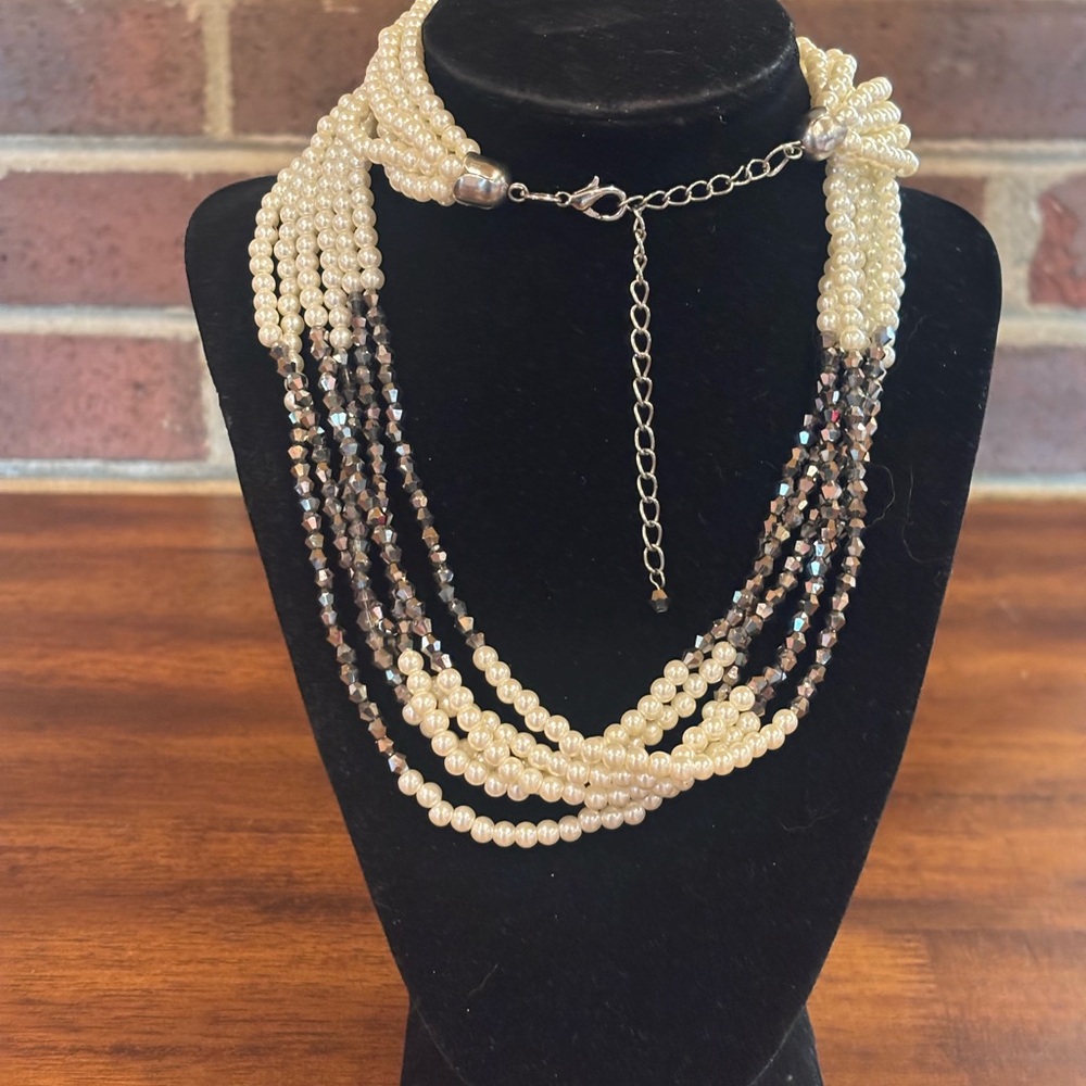 Cream faux pearls and brown glass beads six layer necklace. Adjustable 28”to 32”